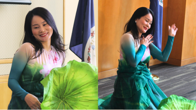 A performer representing the Embassy of the Socialist Republic of Viet Nam during the opening ribbon cutting ceremony for the Viet Nam Exhibition at George Mason University's Special Collection Research Center.