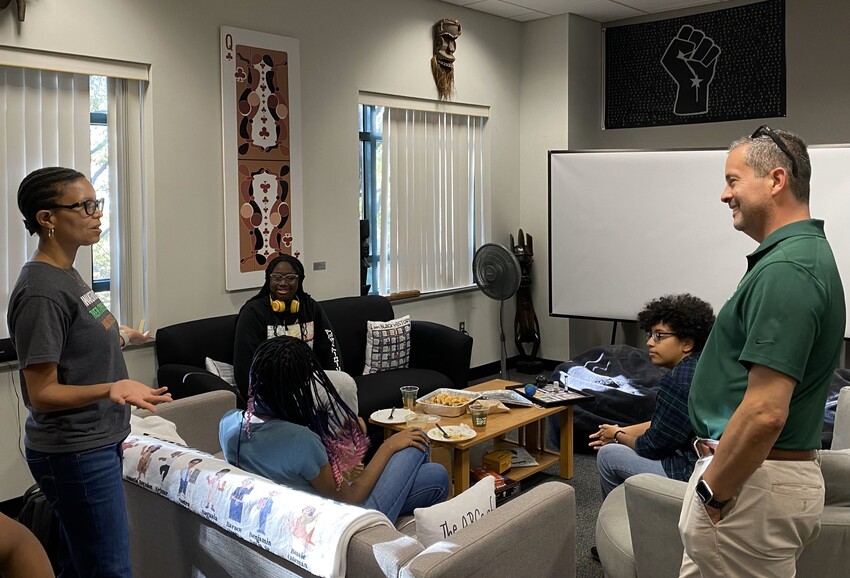 Researchers engaging with archival materials at Mason Libraries